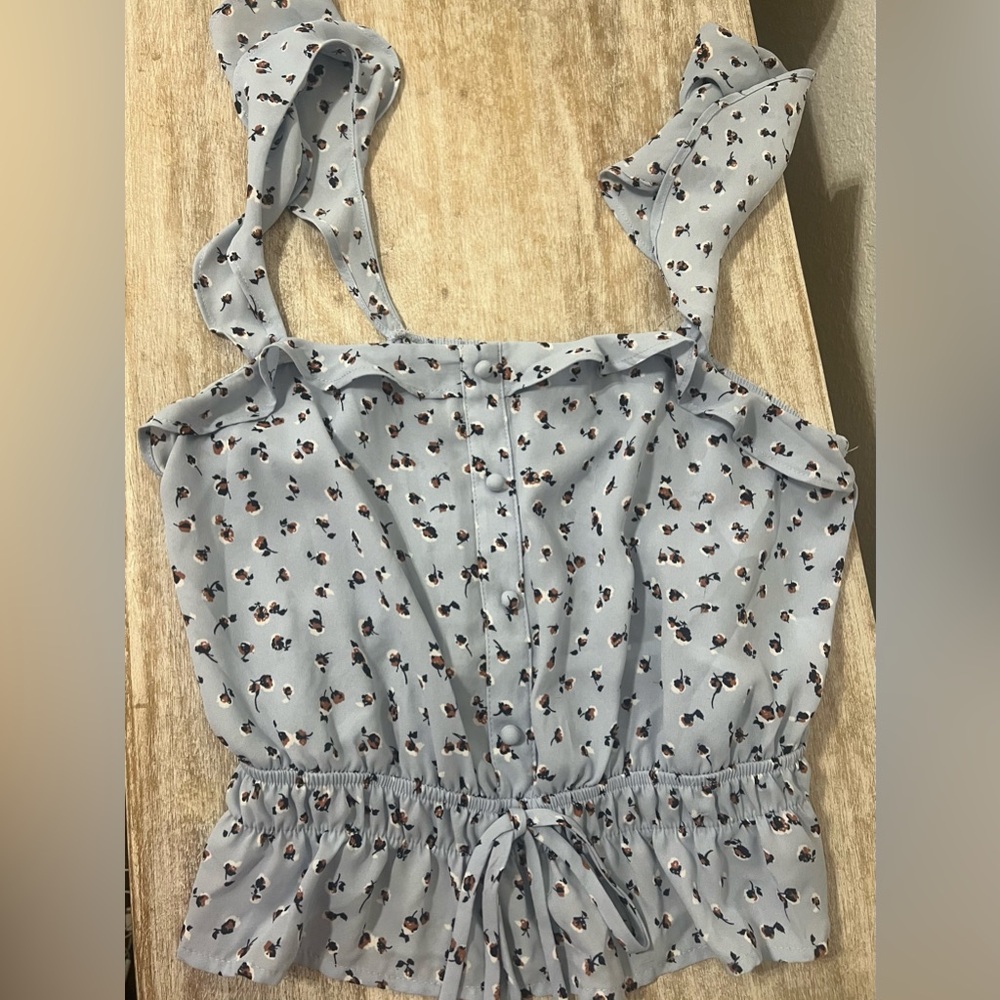 Gorgeous light blue blouse with tan brown flower detailing